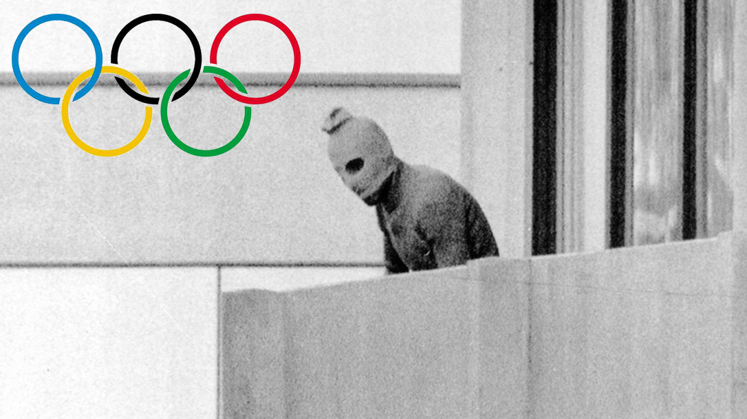 A terrorist appears on a terrace at the Olympic village in Munich in 1972.