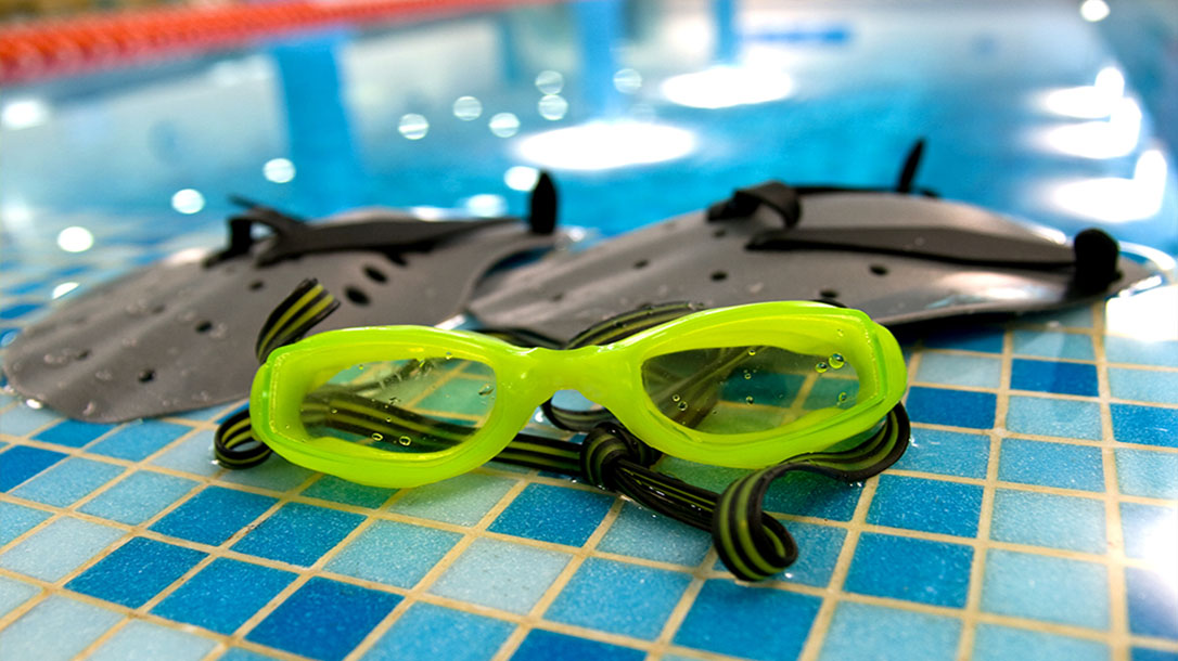 Swim googles and Hankins are useful tools for swimming.