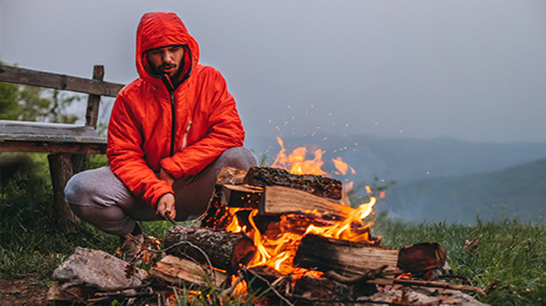 A campfire provides warmth, food, and safety.