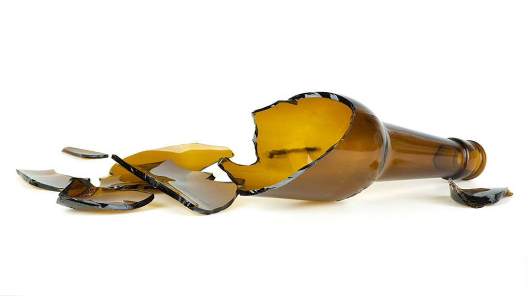 A broken beer bottle becomes a deadly improvised weapon.