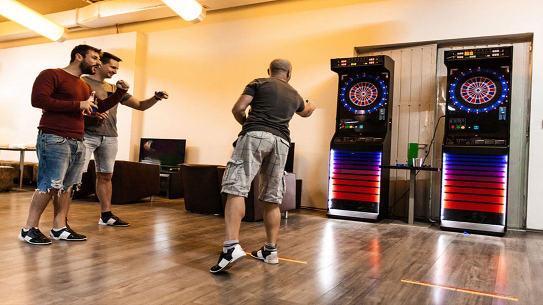 Most bowling alleys have a game area with a dart board for you and your friends to enjoy.