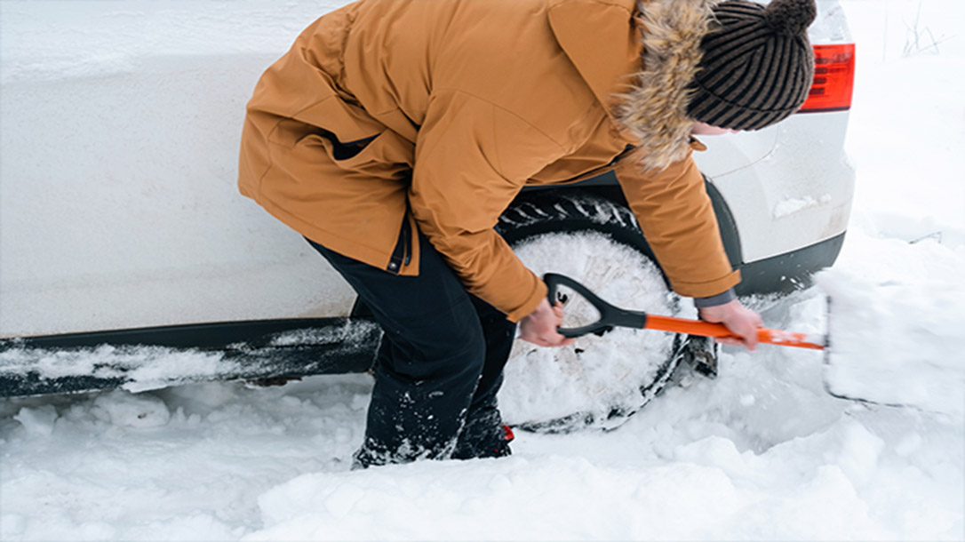 Carrying a shovel in your car can help you get home safely when you become stuck in the snow.